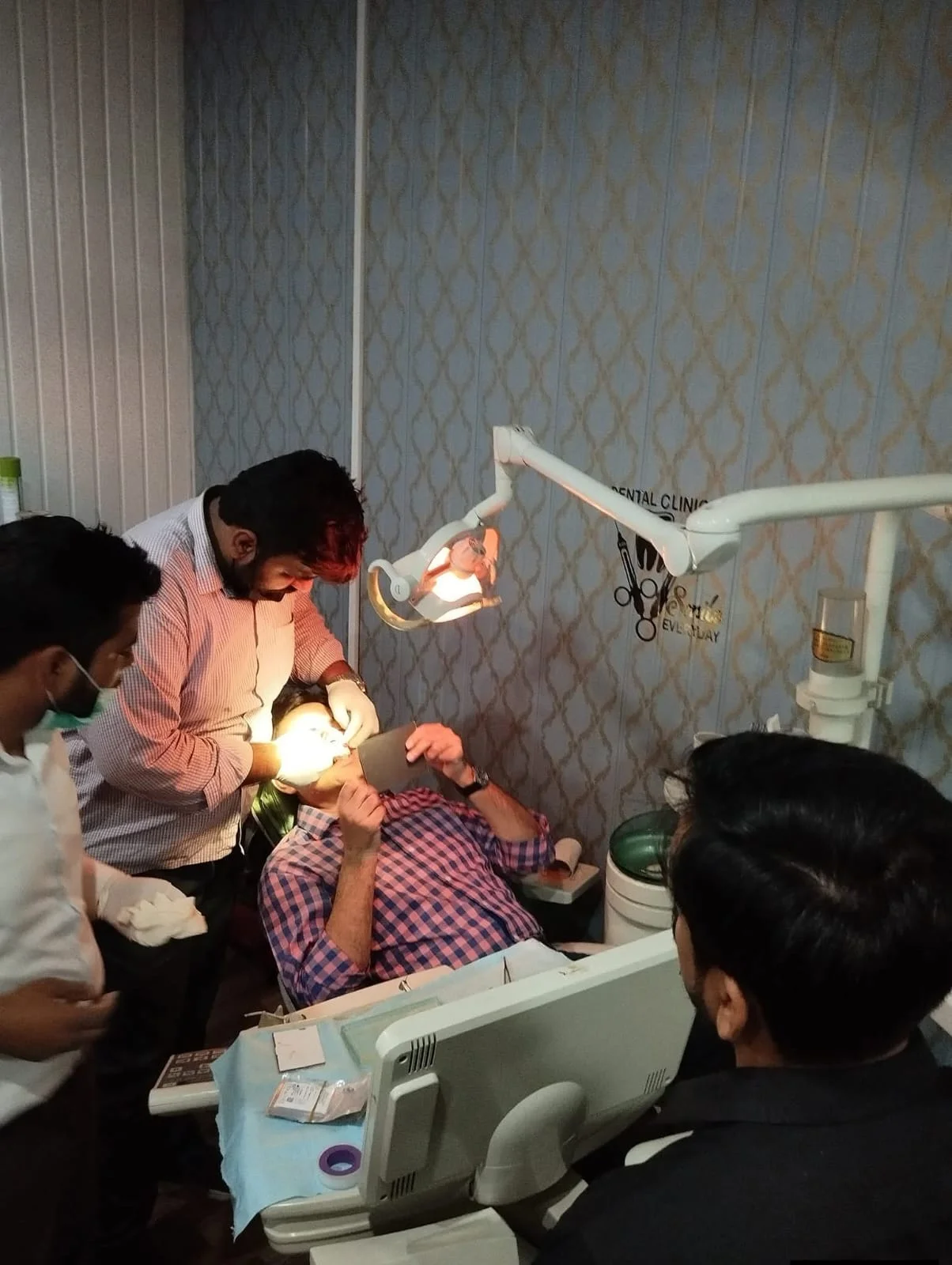 Dental treatment being provided at Life Care Dental Center in Faisalabad